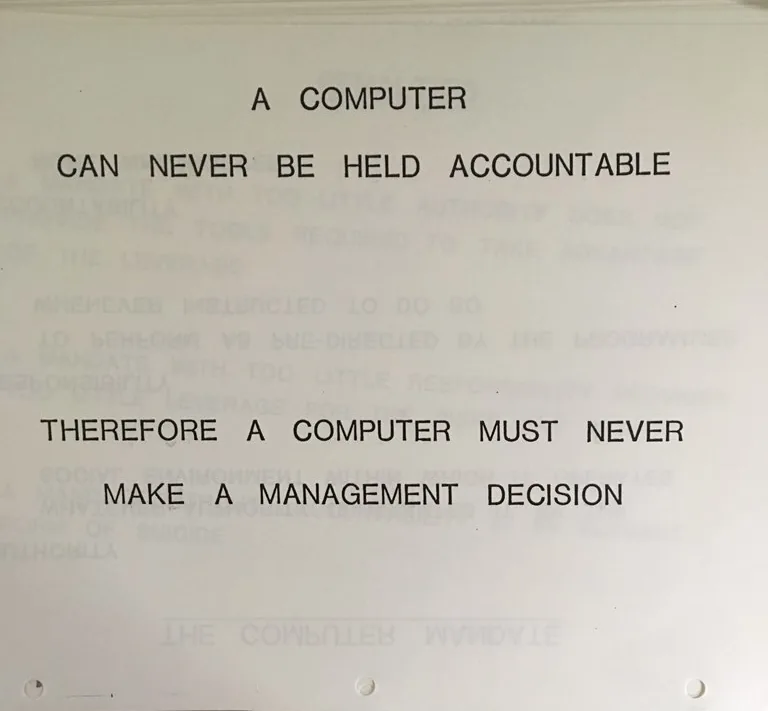 1979 IBM internal training slide: A COMPUTER CAN NEVER BE HELD ACCOUNTABLE / THEREFORE A COMPUTER MUST NEVER MAKE A MANAGEMENT DECISION.